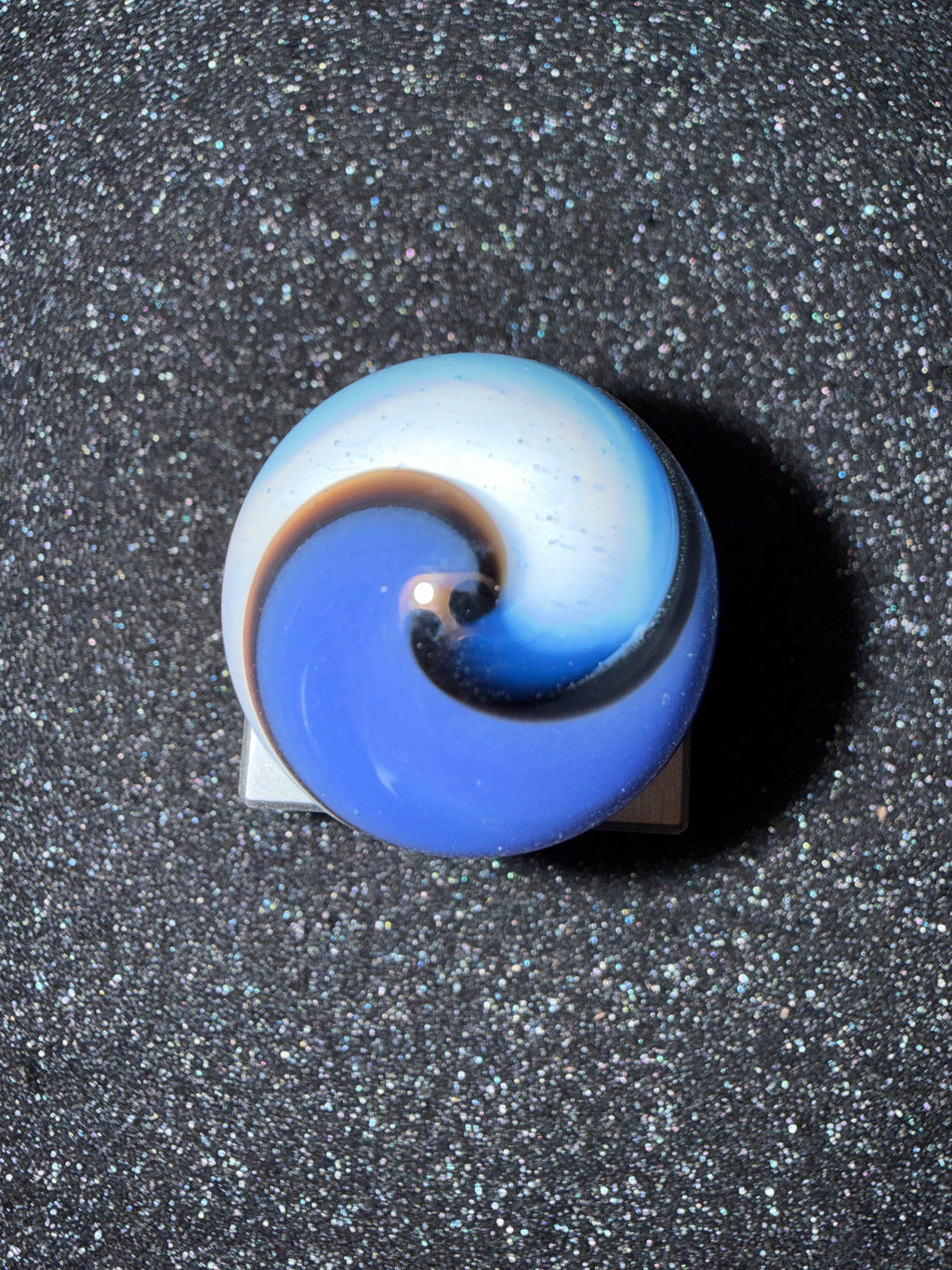 Large blue and white corkscrew