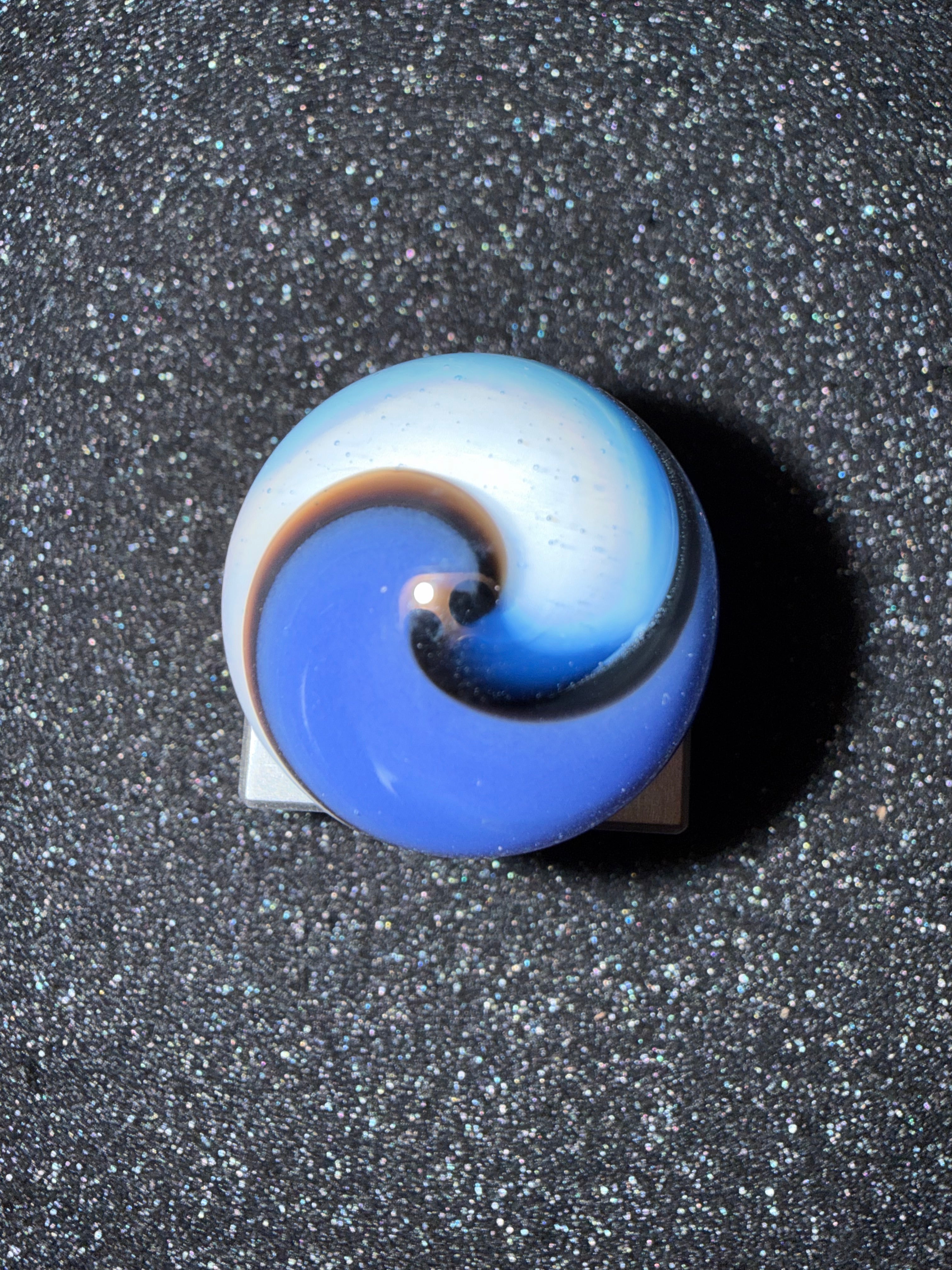 Large blue and white corkscrew