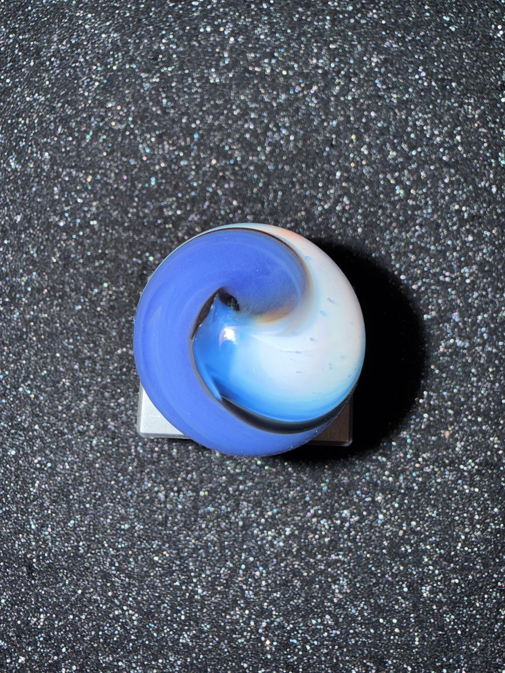 Large blue and white corkscrew